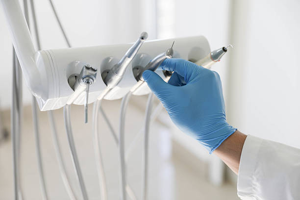 Professional Tooth Extraction technician working in Lakeview, MI